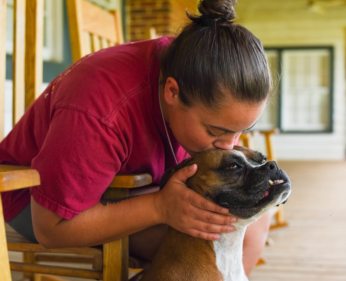 dog lover Kendall with regal the boxer