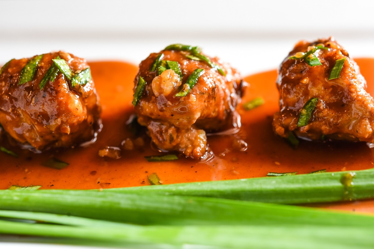 Ground Turkey Meatballs with organic chive garnish 