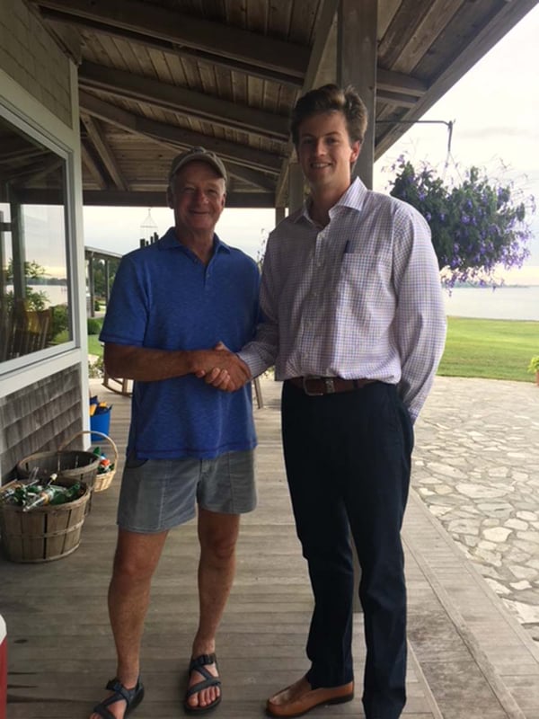 White Oak Pastures intern Alex Henson with Jim Perdue