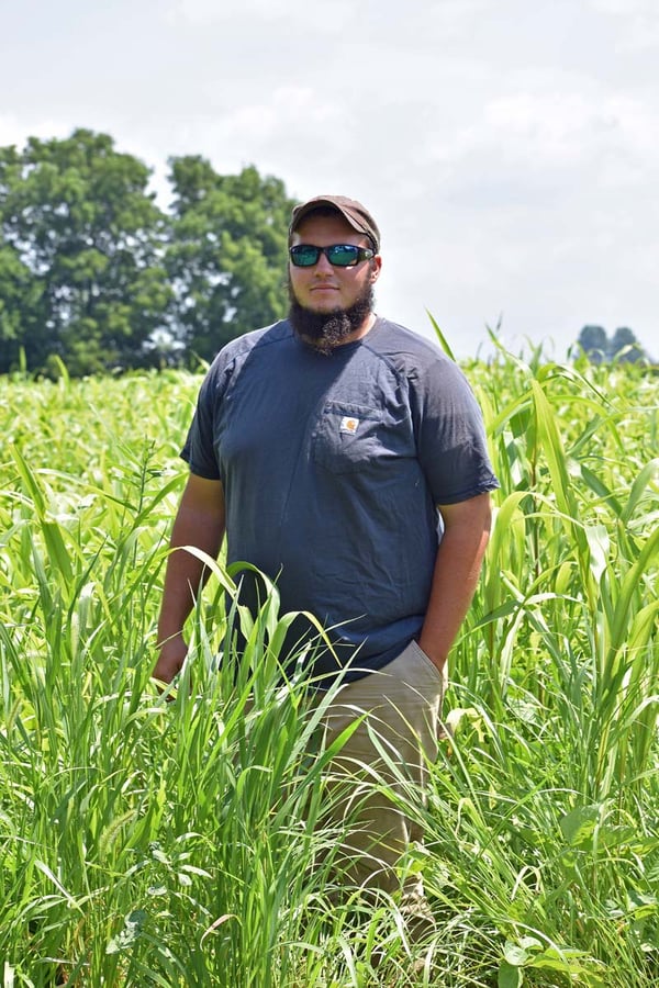 White Oak Pastures intern Dylan DeSutter at his family farm in Attica Indiana