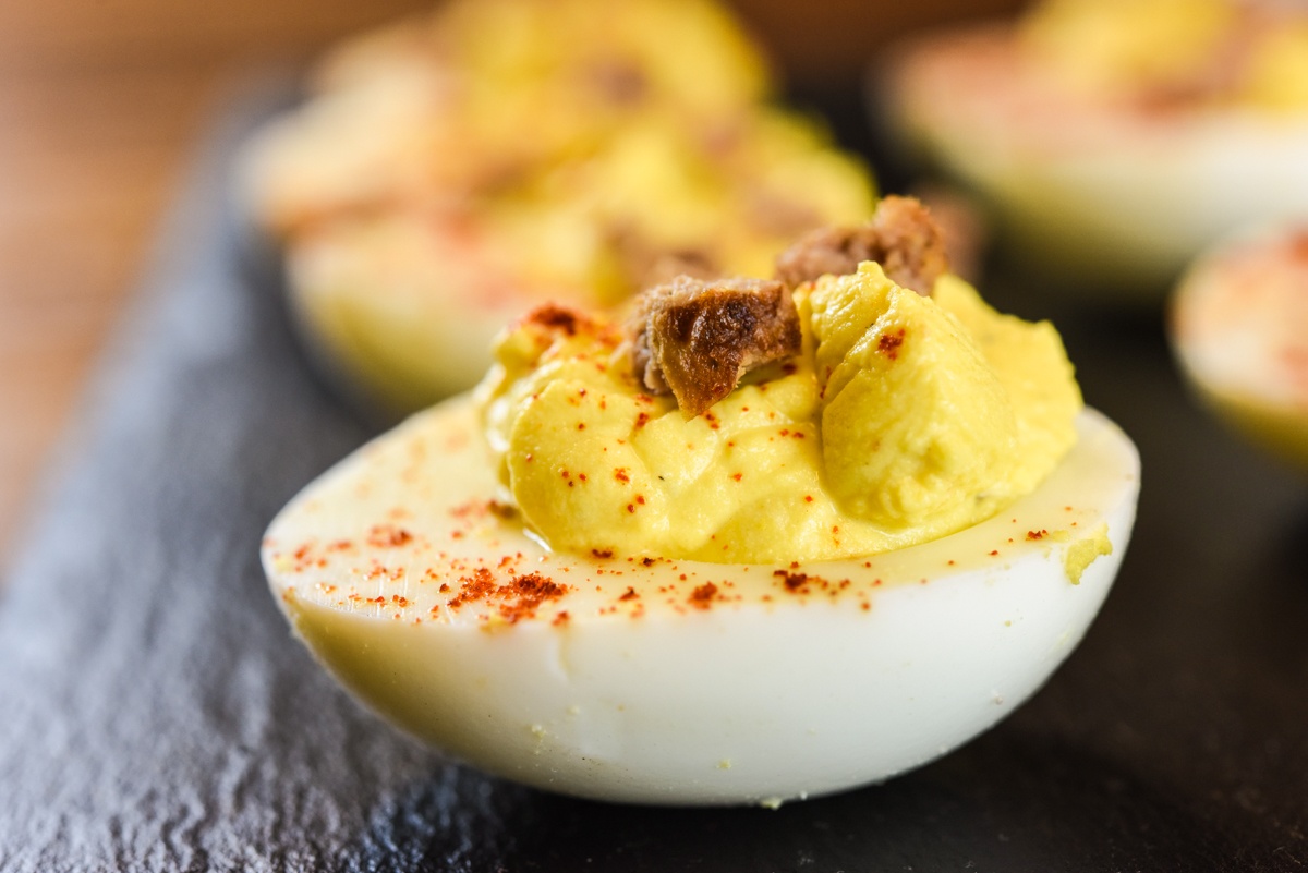 deviled eggs using pasture raised noncom eggs local hot sauce and pasture raised nongmo pork sausage