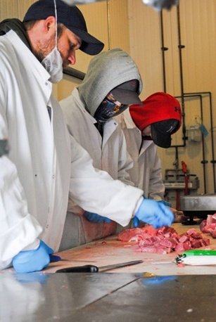 Grinding Room Crew butchers quality sausage making in small batches