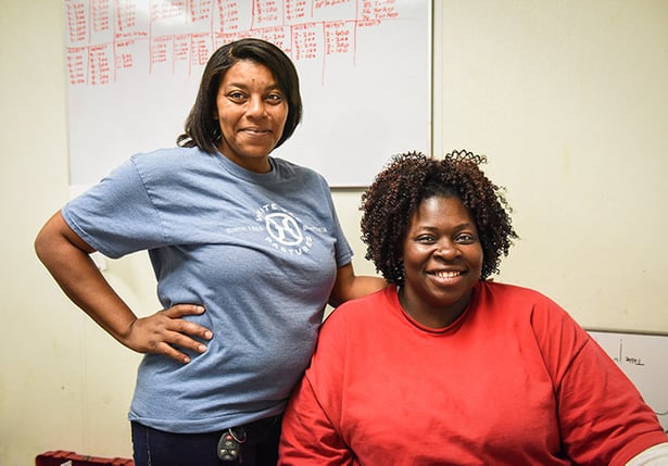 Helaine and Lisa poultry plant women in agriculture.