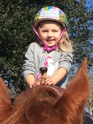 Laura's daughter at the family farm