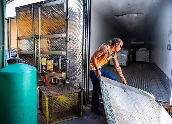 Loading Dock Manager Bubba Jackson loading freezer trucks for wholesale orders.jpg