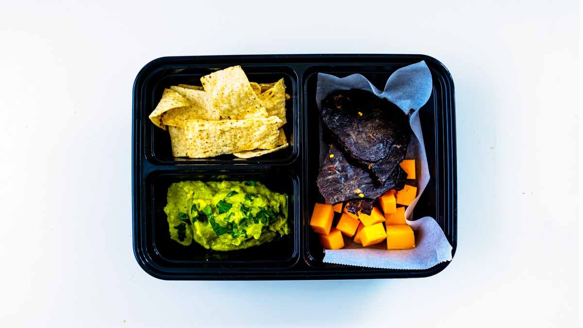 Pasture-raised kids lunch with beef jerky snack sticks and finger foods.