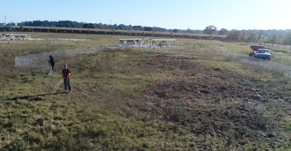 Tre Cates gets arial drone footage of fence being set up at White Oak Pastures